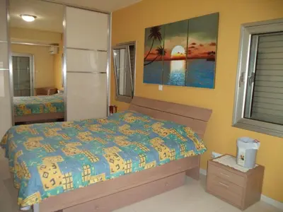 a bedroom with a bed and a window at Modern spotless house with full privacy and WiFi in Aglantzia Nicosia in Aglantzia