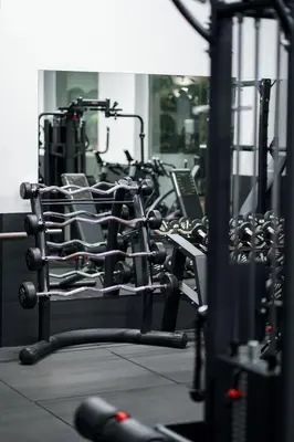 a row of exercise benches in a gym at Bella at Mythical Seas in Paralimni