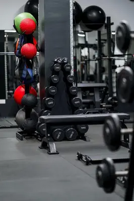 a gym with a bunch of weights and equipment at Bella at Mythical Seas in Paralimni