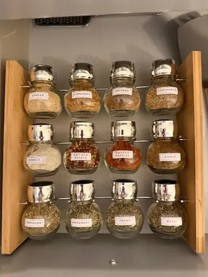 a drawer filled with jars of herbs and spices at Bella at Mythical Seas in Paralimni