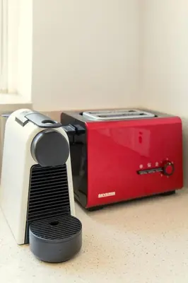 a spatula sitting next to a toaster oven at Family Fig Tree Bay House in Protaras