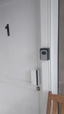 a white door with a mail box on it at Magic Maisonette 250m from the beach in Larnaka