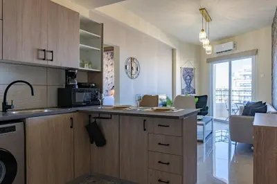 a kitchen with a sink and a counter top at Mosaic - 1 Bedroom Apartment in Larnaca in Larnaka