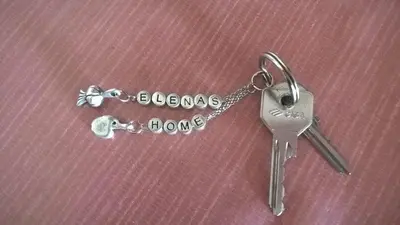 a pair of keys sitting on top of a table at Elenas Home in Limassol