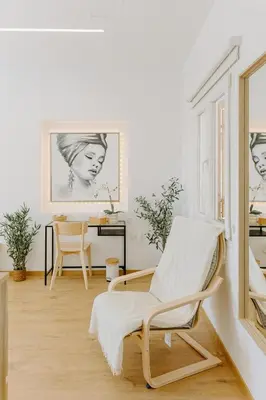 a living room with a chair and a desk at Stylish Stonehouse in Platres in Platres