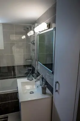 a bathroom with a sink and a mirror at Seaway moments in Limassol