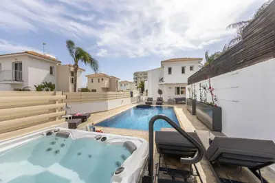 a hot tub on the balcony of a house at Villa Protaras View 6 Central Protaras -Fig Tree Bay-Jacuzzi-Hot Tub in Protaras