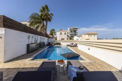 a swimming pool on the roof of a house at Villa Protaras View 6 Central Protaras -Fig Tree Bay-Jacuzzi-Hot Tub in Protaras