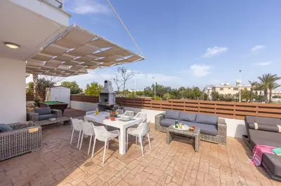 a patio with a table and chairs and a grill at Villa Protaras View 9 Central Protaras -Fig Tree Bay-Jacuzzi-Hot Tub in Protaras