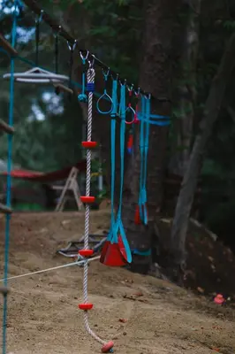 a group of utensils hanging on a rope at Private Glamping Cabin for Family Getaway with BBQ in Arakapas