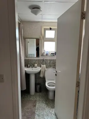 a bathroom with a toilet and a sink at Limassol Star Complex Seaview Apartment in Limassol