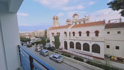 a view of a building with cars parked on a street at STAY Cypress Studio in Limassol
