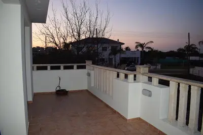 a view of a balcony of a house at Trinity Blue Apt in Paralimni