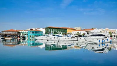 a group of boats are docked in a harbor at Deluxe Seafront - 2 Bed in Limassol