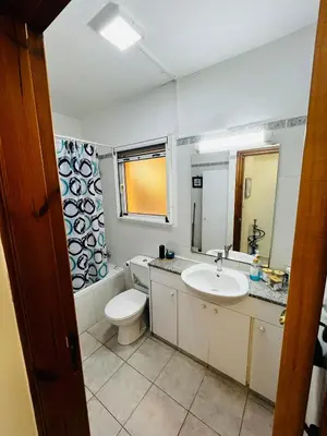 a bathroom with a toilet and a sink at Sofia`s place in Voroklini