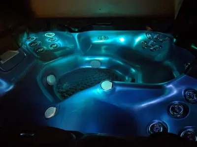 a blue sink with a blue light in a room at El Marco Villa in Pissouri
