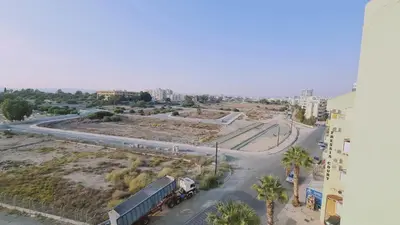 a view of a street with a train on a road at STAY Sea and Salt Lake Panoramic View Apt in Larnaka