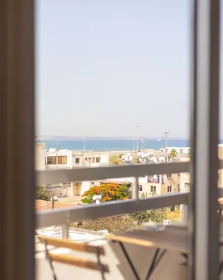 a view of a balcony with a view of the ocean at Stunning apartment with sea view in Larnaka
