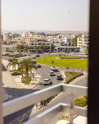 a view of a city from a window at Stunning apartment with sea view in Larnaka