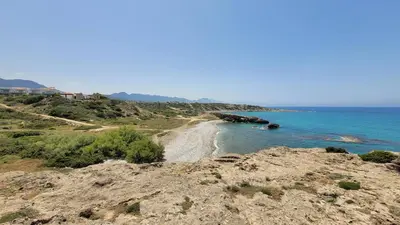 a view of a beach with the ocean at Boho Beach Apartment in Tatlisu