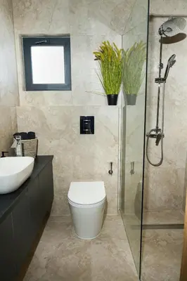 a bathroom with a shower and a toilet and a sink at 4BR BrandNEW LUX Villa Protaras in Paralimni