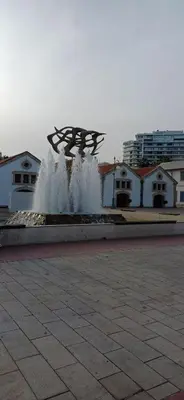 a water fountain in the middle of a street at Makenzy Mermaid 2 Bedroom Apartment in Larnaka