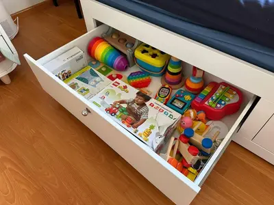 a drawer filled with toys in a childs bedroom at Beachfront apartment with Kids Room, Pool & 2 Workspaces in Limassol