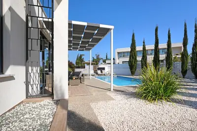 a view of a house with a swimming pool at Villa Camellia - 3bed Bungalow large pool in Protaras