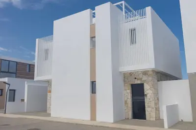 a rendering of a white building with a tower at Protaras Aqua Villa AQ05 in Protaras