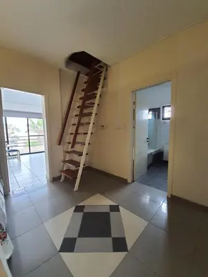 a room with a staircase and a room with a door at Bright and Cozy 2-Bedroom Apartment in Strovolos in Strovolos
