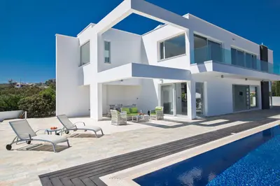 a white villa with a swimming pool at Villa Marilia in Protaras