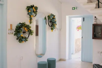 a room with two wreaths on the wall at Siogkas Inn in Dherinia