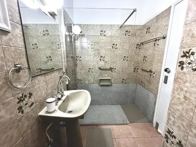 a bathroom with a sink and a shower at STAY NISSI Chrysland Studios in Ayia Napa