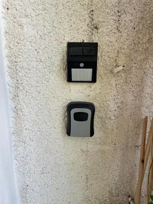 a wall with a toaster sitting on top of it at Yard room with private entrance in Larnaka