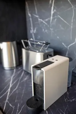a toaster sitting on top of a kitchen counter at Mi Filoxenia 2 in Aglantzia