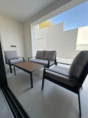 a living room with a couch and a coffee table at 204 Lux Suites Level2 Tower 206 in Nicosia