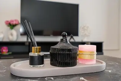 a toothbrush and comb on a holder on a counter at Cozy Apartment in Kapparis # 506 in Paralimni