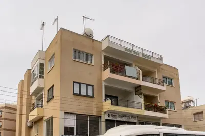 a building with balconies on the side of it at Azura 3 Bedroom Apartment in Larnaka
