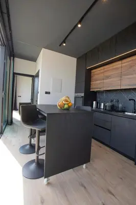 a kitchen with a table and chairs in a room at Mi Filoxenia 1 in Aglantzia