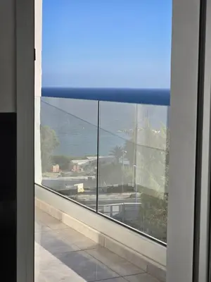 a view from a window of a room with a view at White Sea View Apartment in Limassol