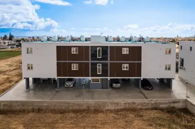 an overhead view of a building on top of a building at Modern 2BR Apartment Near Ayia Napa - Anastasia 101 in Xylophaghou