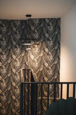 a room with a wall with a wallpaper withigers at Kition Urban Suite 3 in Larnaka