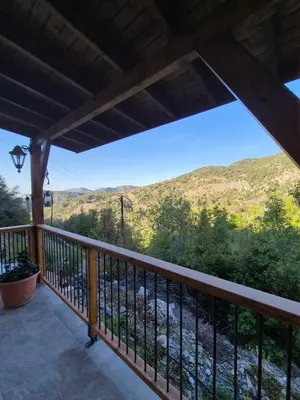 a balcony with a view of a mountain at Cozy Paradise in Pedoulas