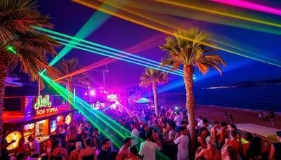 a crowd of people at a party on the beach at STAY Sunny Honey Apartment in Ayia Napa