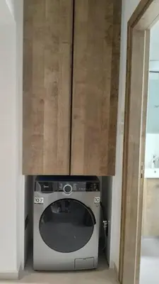 a microwave in a kitchen with a door open at Verasia Acute Stay in Engomi in Engomi
