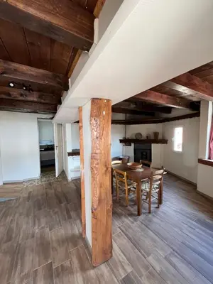 a dining room with a table and chairs at Odou Off-grid in Odhou
