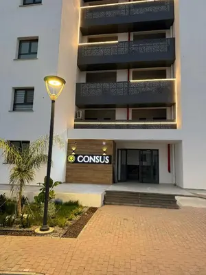a street light in front of a building at CEASAR RESORT STUDIO Consus in Aglantzia