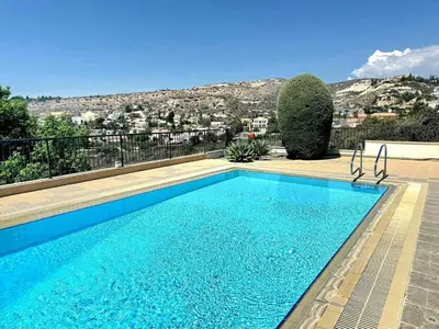 a swimming pool on top of a house at Serenity Pool & Garden Villa in Limassol