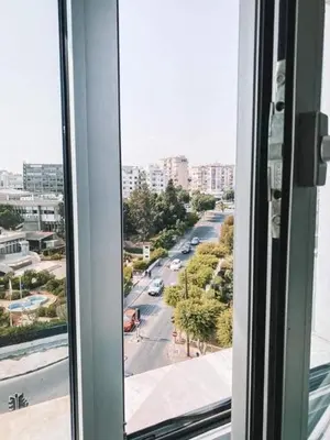 a view of a city street from a window at The Suave - Limassol City Centre Luxury in Limassol