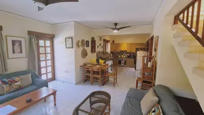 a living room with a couch and a table at STAY Villa Michalis in Pissouri